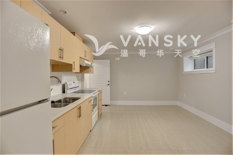 260401111506_2 lower 2bd kitchen living.jpeg